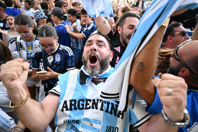 Argentina fans react to their team's second goal during a watch party for the 2026 World Cup semi-final match between England and Argentina in Miami Beach, Florida, on July 15, 2026. (Photo by CHANDAN KHANNA / AFP)