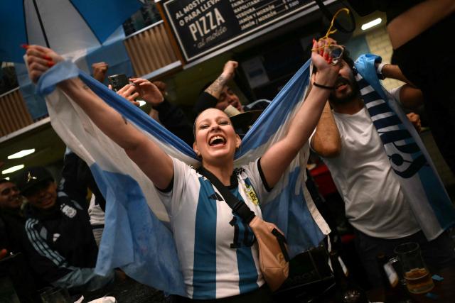 Fans of Argentina react as they watch the 2026 FIFA World Cup semi-final football match between England and Argentina, in Buenos Aires on July 15, 2026. (Photo by Luis ROBAYO / AFP)