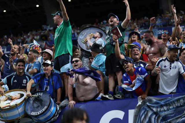 Argentine fans celebrate at the end of the 2026 World Cup football tournament semi-final match between England and Argentina at the Atlanta Stadium in Atlanta on July 15, 2026.  (Photo by Thomas COEX / AFP)