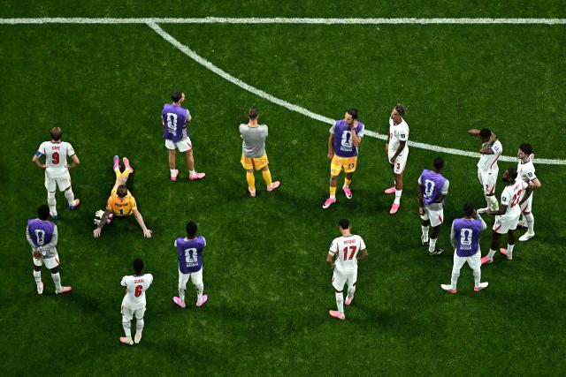 England's players react after losing the 2026 World Cup football tournament semi-final match against Argentina at the Atlanta Stadium in Atlanta on July 15, 2026.  (Photo by Jewel SAMAD / AFP)
