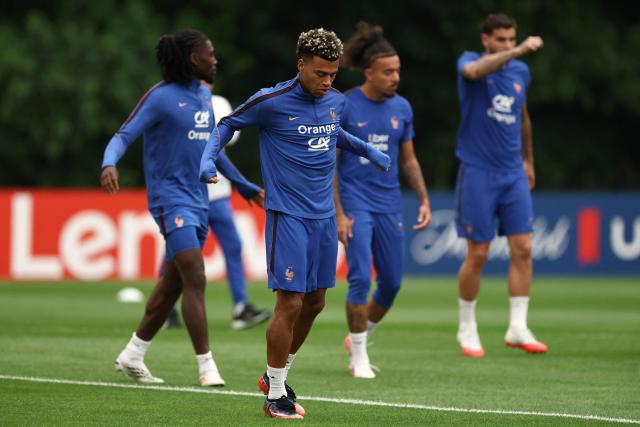 France's forward #20 Desire Doue exercises during a training session at Bentley University in Waltham, near Boston on July 15, 2026. (Photo by FRANCK FIFE / AFP)