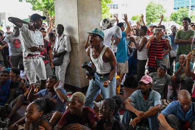 Fans celebrate Argentina's victory over England in the semi-final of the FIFA World Cup 2026 in Havana on July 15, 2026. (Photo by YAMIL LAGE / AFP)
