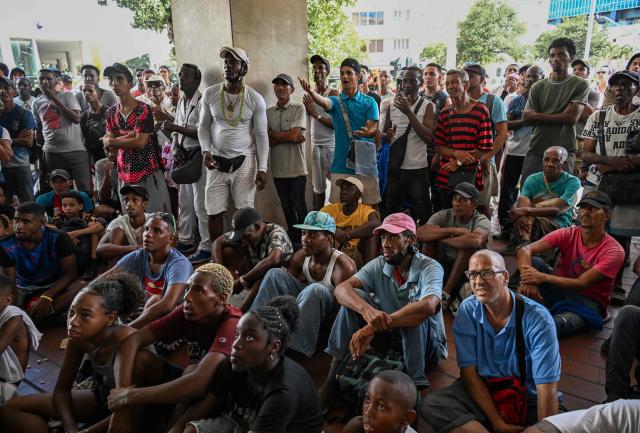 Fans watch the 2026 World Cup semi-final between England and Argentina in Havana, on July 15, 2026. (Photo by YAMIL LAGE / AFP)