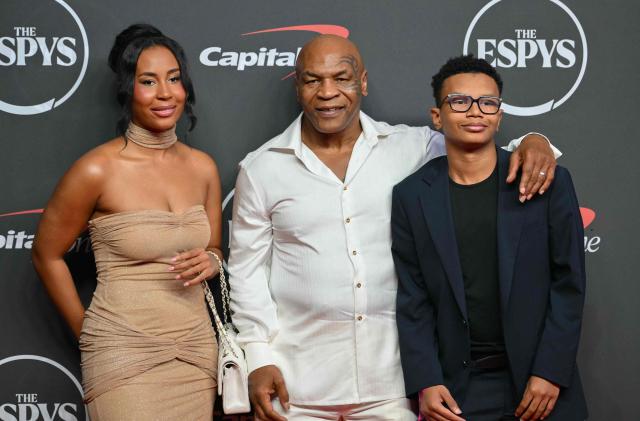 US boxer and actor Mike Tyson with his wife Lakiha Spicer and their son Morocco Elijah Tyson attend the 2026 ESPY Awards at the David H. Koch Theater at Lincoln Center in New York on July 15, 2026. (Photo by ANGELA WEISS / AFP)