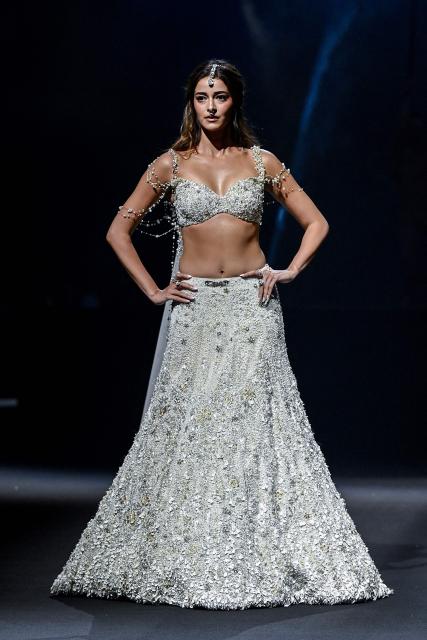 Bollywood actress Ananya Panday presents a creation by Indian designer Gaurav Gupta during the couture show in Mumbai on July 17, 2026. (Photo by Sujit JAISWAL / AFP)