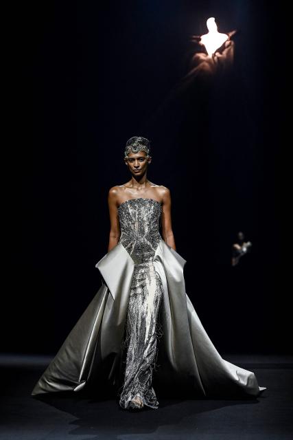 A model presents a creation by Indian designer Gaurav Gupta during the couture show in Mumbai on July 17, 2026. (Photo by Sujit JAISWAL / AFP)