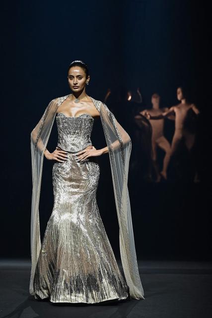 A model presents a creation by Indian designer Gaurav Gupta during the couture show in Mumbai on July 17, 2026. (Photo by Sujit JAISWAL / AFP)
