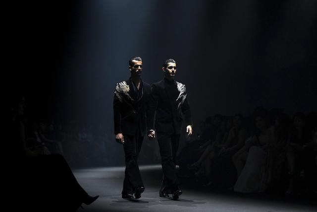 Models present creations by Indian designer Gaurav Gupta during the couture show in Mumbai on July 17, 2026. (Photo by Sujit JAISWAL / AFP)