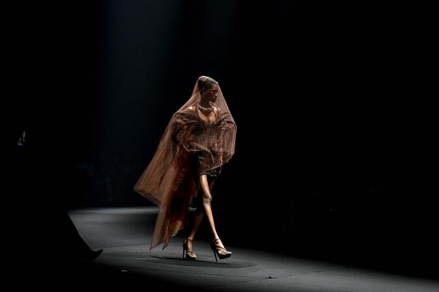 A model presents a creation by Indian designer Gaurav Gupta during the couture show in Mumbai on July 17, 2026. (Photo by Sujit JAISWAL / AFP)