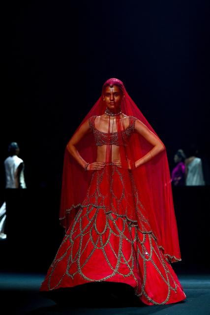 A model presents a creation by Indian designer Gaurav Gupta during the couture show in Mumbai on July 17, 2026. (Photo by Sujit JAISWAL / AFP)