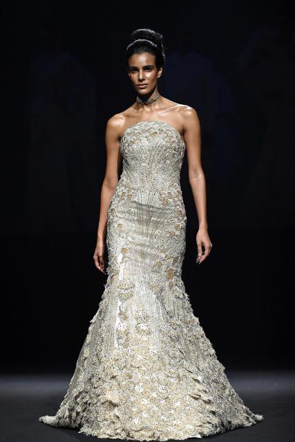 A model presents a creation by Indian designer Gaurav Gupta during the couture show in Mumbai on July 17, 2026. (Photo by Sujit JAISWAL / AFP)