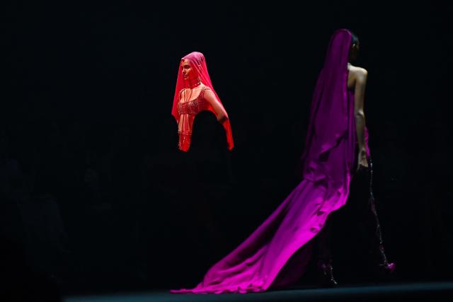 Models present creations by Indian designer Gaurav Gupta during the couture show in Mumbai on July 17, 2026. (Photo by Sujit JAISWAL / AFP)
