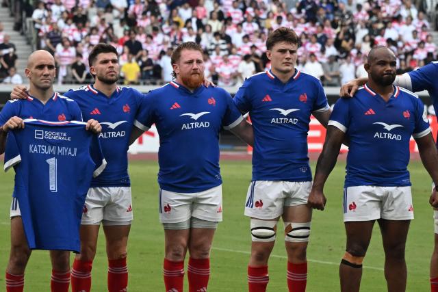 The French team stands together before their rugby union Nations Championship match against Japan at the National Stadium in Tokyo on July 18, 2026. (Photo by ANDREW CABALLERO-REYNOLDS / AFP)