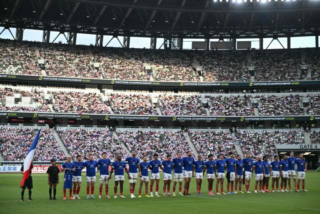 The French team stands together before their rugby union Nations Championship match against Japan at the National Stadium in Tokyo on July 18, 2026. (Photo by ANDREW CABALLERO-REYNOLDS / AFP)