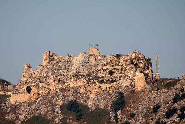 (FILES) An Israeli flag flies over the medieval Beaufort Castle, known locally as Qalaat al-Shaqif or Shaqif Arnoun, as seen from the Marjayoun area of southern Lebanon on May 31, 2026. The United Nations looks set to list a Biblical site, Lebanese castles, an antelope migration path and the world's deepest lake as world treasures under threat, including from war or climate change. The 196 members states of the United Nations Educational, Scientific and Cultural Organisation (UNESCO) are to cast votes from Friday next week on new additions to its World Heritage and World Heritage in Danger lists when they meet in Busan, South Korea. (Photo by AFP)