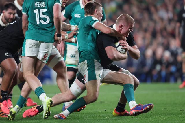 Anton Segner of New Zealand is tackled during the rugby Nations Championship match between New Zealand and Ireland at Eden Park in Auckland on July 18, 2026. (Photo by Michael Bradley / AFP)