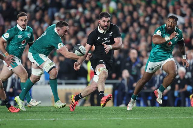 Luke Jacobson of New Zealand passes the ball during the rugby Nations Championship match between New Zealand and Ireland at Eden Park in Auckland on July 18, 2026. (Photo by Michael Bradley / AFP)