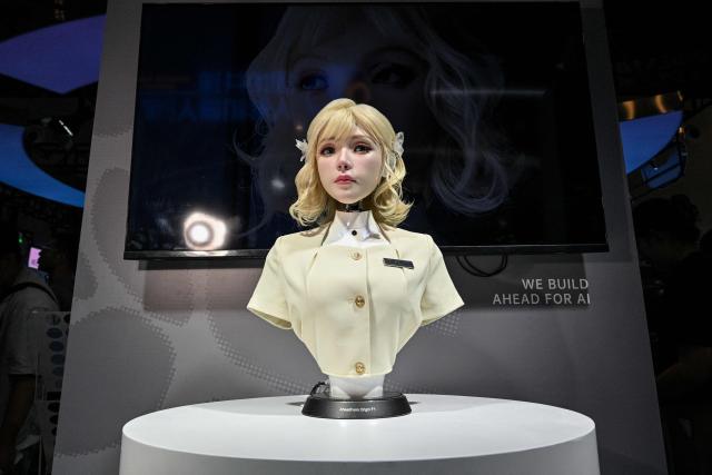 A humanoid robot by AheadForm is pictured during the World Artificial Intelligence Conference (WAIC) in Shanghai on July 18, 2026. (Photo by Hector RETAMAL / AFP)