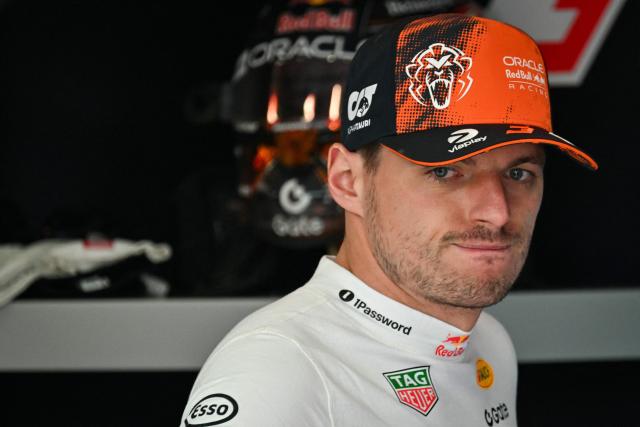 Red Bull Racing's Dutch driver Max Verstappen reacts as he speaks with a team mechanic during the third practice session at the Spa-Francorchamps circuit, in Spa, ahead of the Formula One Belgian Grand Prix, on July 18, 2026. (Photo by Andrej ISAKOVIC / AFP)