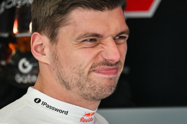 Red Bull Racing's Dutch driver Max Verstappen reacts as he speaks with a team mechanic during the third practice session at the Spa-Francorchamps circuit, in Spa, ahead of the Formula One Belgian Grand Prix, on July 18, 2026. (Photo by Andrej ISAKOVIC / AFP)