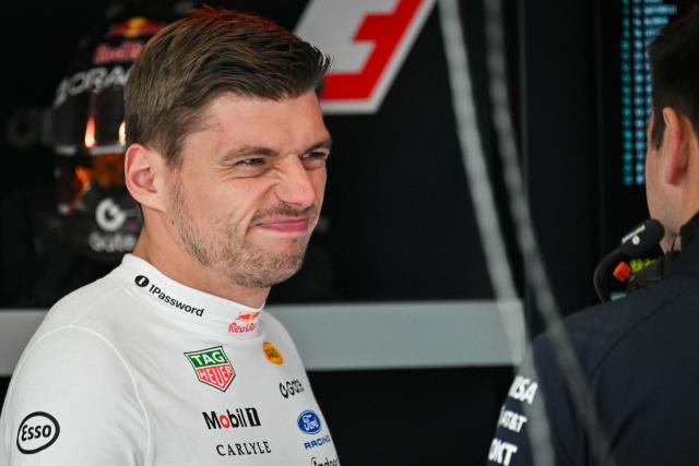 Red Bull Racing's Dutch driver Max Verstappen reacts as he speaks with a team mechanic during the third practice session at the Spa-Francorchamps circuit, in Spa, ahead of the Formula One Belgian Grand Prix, on July 18, 2026. (Photo by Andrej ISAKOVIC / AFP)
