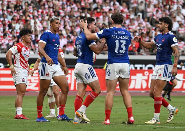 French players celebrate a try by Matthieu Jalibert (C) during the Rugby Nations Championship Southern Hemisphere Series against Japan at the National Stadium in Tokyo on July 18, 2026. (Photo by ANDREW CABALLERO-REYNOLDS / AFP)