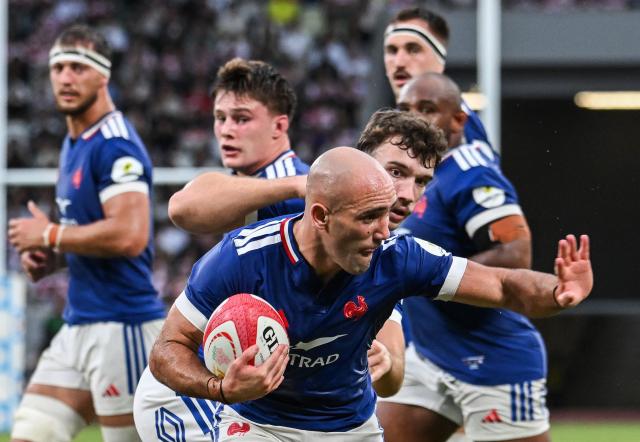 France’s Maxime Lucu runs to score a try during the Rugby Nations Championship Southern Hemisphere Series against Japan at the National Stadium in Tokyo on July 18, 2026. (Photo by ANDREW CABALLERO-REYNOLDS / AFP)