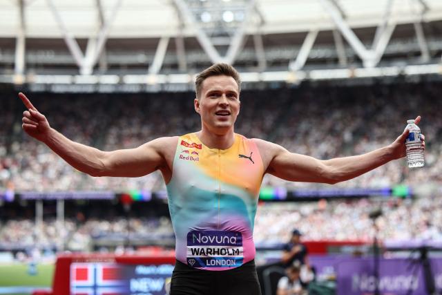 Norway's Karsten Warholm celebrates after winning the men's 400m hurdles event during the IAAF Diamond League athletics competition at the London stadium in London on July 18, 2026. (Photo by Henry Nicholls / AFP)