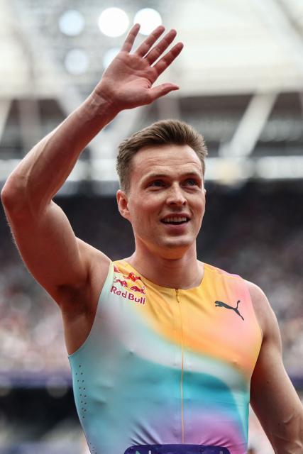 Norway's Karsten Warholm celebrates after winning the men's 400m hurdles event during the IAAF Diamond League athletics competition at the London stadium in London on July 18, 2026. (Photo by Henry Nicholls / AFP)