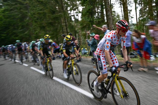 Team Visma | Lease a Bike's Danish rider Jonas Vingegaard wearing the climber's dotted "King of the Mountains" jersey cycles in the Grand Ballon ascent during the 14th stage of the 113th edition of the Tour de France cycling race, 155,3 km between Mulhouse and Le Markstein in the Vosges mountains, on July 18, 2026. (Photo by Loic VENANCE / AFP)