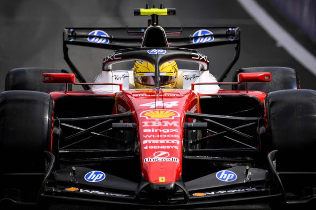 Ferrari's British driver Lewis Hamilton leaves the garage to compete during the qualifying session at the Spa-Francorchamps circuit, in Spa, ahead of the Formula One Belgian Grand Prix, on July 18, 2026. (Photo by JOHN THYS / AFP)