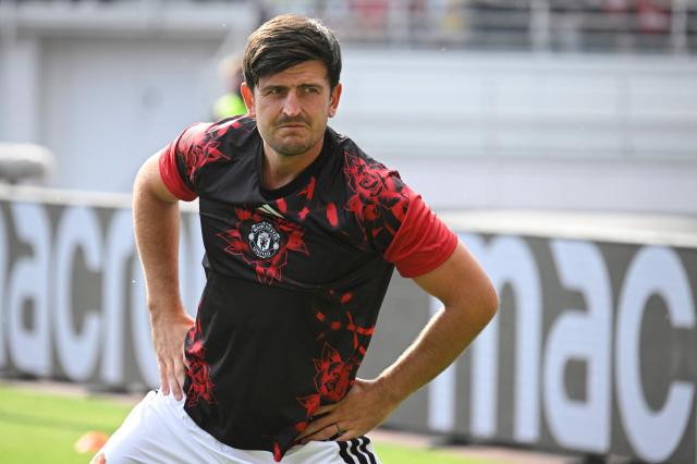 Manchester United's English defender #05 Harry Maguire warms up prior to the  pre-season friendly match between English Premier League football club Manchester United and EFL Championship club Wrexham AFC at Helsinki Olympic Stadium in Helsinki, Finland on July 18, 2026. (Photo by Markku Ulander / Lehtikuva / AFP) / Finland OUT