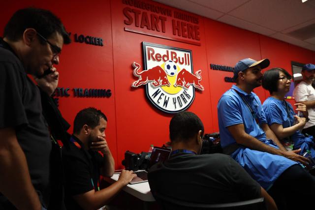 Members of the media wait on the media centre after a Spain's training session was postponed due to weather conditions in New Jersey, on July 18, 2026. Spain and Argentina will meet in the 2026 World Cup football tournament final match at the New York/New Jersey Stadium in East Rutherford on July 19, 2026. (Photo by FRANCK FIFE / AFP)