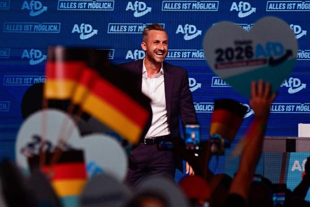Ulrich Siegmund, top candidate of the far-right Alternative for Germany (AfD) party for Saxony-Anhalt, takes the stage during an election campaign event ahead of the state elections in Saxony-Anhalt, in Magdeburg, eastern Germany on July 18, 2026. Slogan reads "Everything is possible". The crucial state election in the German eastern federal state of Saxony-Anhalt is scheduled to take place on September 6, 2026. (Photo by John MACDOUGALL / AFP)
