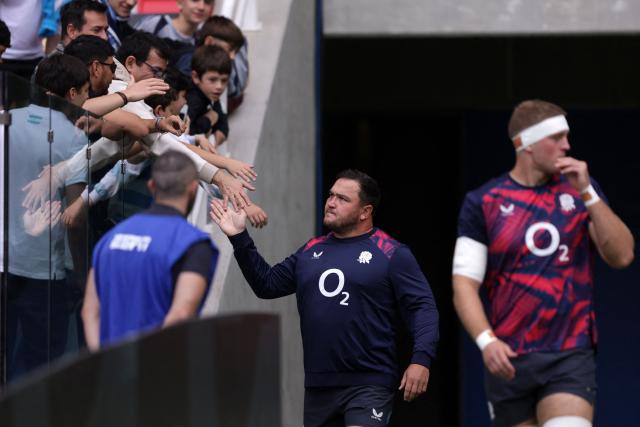 Jamie George of England is greeted by people at the stands before the Rugby Union Nations Championship match between Argentina and England at Unico Madre de Ciudades stadium in Santiago del Estero, Argentina, on July 18, 2026. (Photo by Juan GASPARINI / AFP)