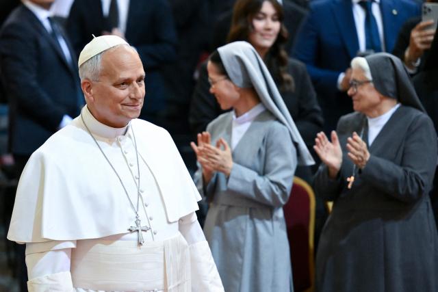 Pope Leo XIV arrives to attend a concert in the Apostolic Palace at the summer papal residence in Castel Gandolfo on July 18, 2026. (Photo by Alberto PIZZOLI / AFP)