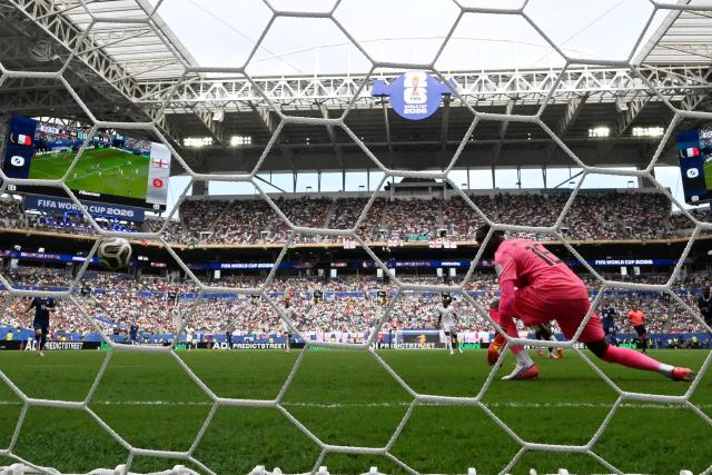 France's goalkeeper #16 Mike Maignan concedes a goal scored by England's midfielder #04 Declan Rice (out of frame) and his team's first goal during the 2026 World Cup football tournament third-place match between France and England at the Miami Stadium in Miami on July 18, 2026.  (Photo by CHANDAN KHANNA / AFP)
