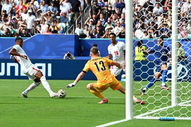 England's defender #02 Ezri Konsa (L) blocks a shot by France's forward #10 Kylian Mbappe (R) past England's goalkeeper #13 Dean Henderson during the 2026 World Cup football tournament third-place match between France and England at the Miami Stadium in Miami on July 18, 2026.  (Photo by ROBERTO SCHMIDT / AFP)