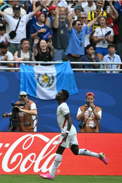 England's forward #07 Bukayo Saka celebrates scoring his team's fourth goal during the 2026 World Cup football tournament third-place match between France and England at the Miami Stadium in Miami on July 18, 2026.  (Photo by ROBERTO SCHMIDT / AFP)