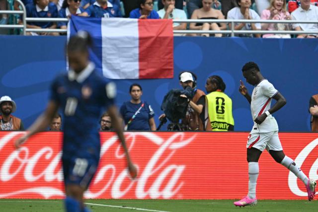 England's forward #07 Bukayo Saka celebrates scoring his team's fourth goal during the 2026 World Cup football tournament third-place match between France and England at the Miami Stadium in Miami on July 18, 2026.  (Photo by ROBERTO SCHMIDT / AFP)