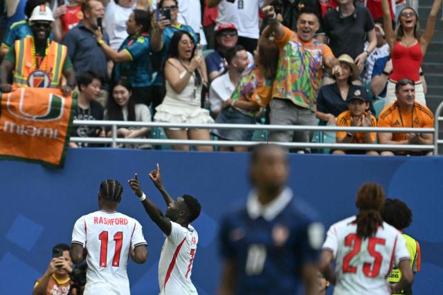 England's forward #07 Bukayo Saka celebrates scoring his team's fourth goal during the 2026 World Cup football tournament third-place match between France and England at the Miami Stadium in Miami on July 18, 2026.  (Photo by ROBERTO SCHMIDT / AFP)