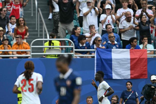 England's forward #07 Bukayo Saka celebrates scoring his team's fourth goal during the 2026 World Cup football tournament third-place match between France and England at the Miami Stadium in Miami on July 18, 2026.  (Photo by ROBERTO SCHMIDT / AFP)