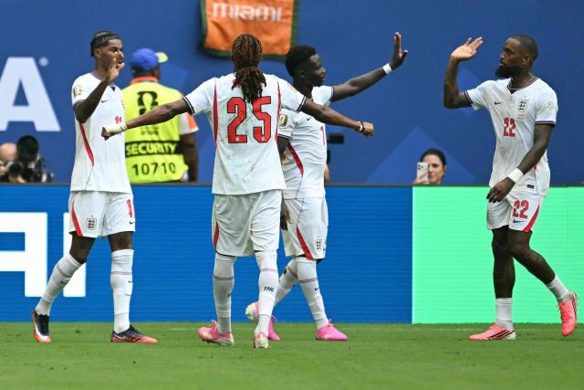 England's forward #07 Bukayo Saka celebrates scoring his team's fourth goal with teammates during the 2026 World Cup football tournament third-place match between France and England at the Miami Stadium in Miami on July 18, 2026.  (Photo by ROBERTO SCHMIDT / AFP)