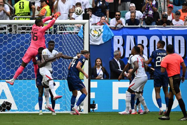 France's goalkeeper #16 Mike Maignan clears the ball during the 2026 World Cup football tournament third-place match between France and England at the Miami Stadium in Miami on July 18, 2026.  (Photo by ROBERTO SCHMIDT / AFP)