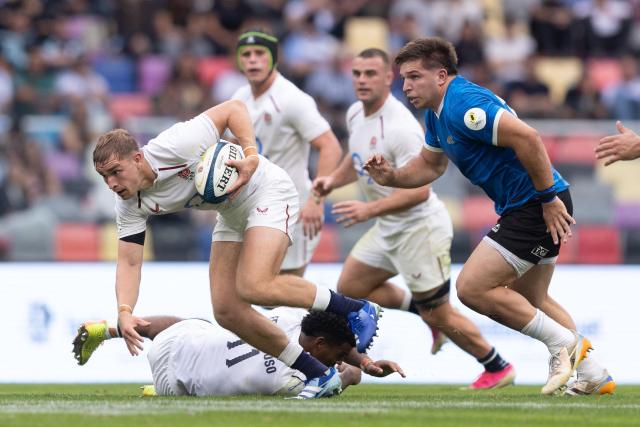 England's scrum-half Jack van Poortvliet runs with the ball during the Rugby Union Nations Championship match between Argentina and England at Unico Madre de Ciudades stadium in Santiago del Estero, Argentina, on July 18, 2026. (Photo by Juan GASPARINI / AFP)