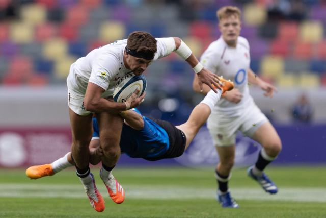 England's centre Henry Slade (L) is tackled by Argentina's centre Matias Moroni during the Rugby Union Nations Championship match between Argentina and England at Unico Madre de Ciudades stadium in Santiago del Estero, Argentina, on July 18, 2026. Argentina players wear a blue jersey as a tribute to the Argentina national football team that defeated England with goals by Diego Maradona at the Mexico 1986 World Cup. (Photo by Juan GASPARINI / AFP)