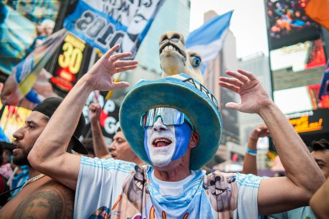Argentina fans gather and celebrate in Times Square in New York, on July 18, 2026, ahead of the 2026 World Cup Final between Spain and Argentina. (Photo by Ryan MURPHY / AFP)