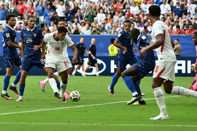 England's midfielder #10 Jude Bellingham scores his team's sixth goal during the 2026 World Cup football tournament third-place match between France and England at the Miami Stadium in Miami on July 18, 2026.  (Photo by ROBERTO SCHMIDT / AFP)