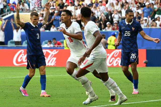 England's midfielder #10 Jude Bellingham celebrates scoring his team's sixth goal during the 2026 World Cup football tournament third-place match between France and England at the Miami Stadium in Miami on July 18, 2026.  (Photo by ROBERTO SCHMIDT / AFP)