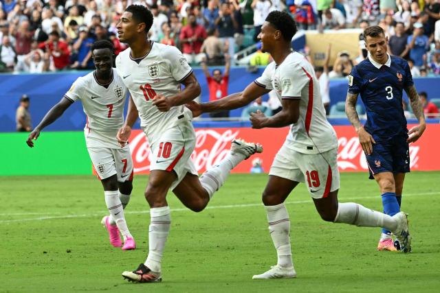 TOPSHOT - England's midfielder #10 Jude Bellingham celebrates scoring his team's sixth goal during the 2026 World Cup football tournament third-place match between France and England at the Miami Stadium in Miami on July 18, 2026.  (Photo by ROBERTO SCHMIDT / AFP)